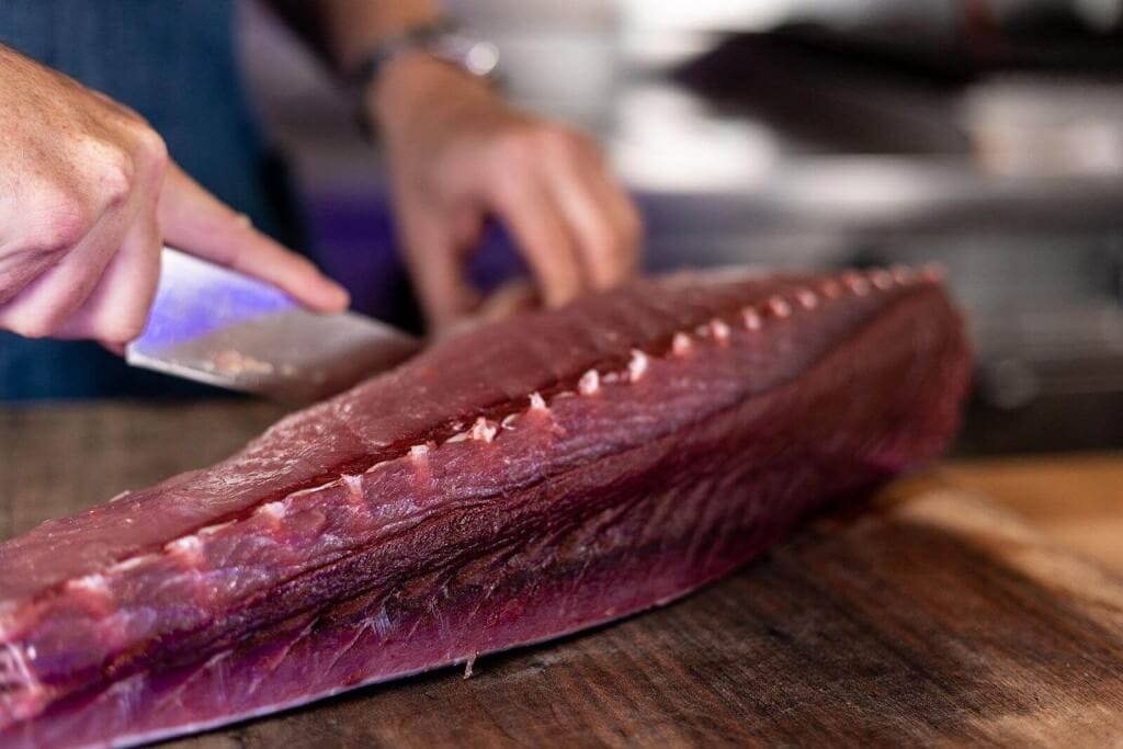 Local seafood preparation at Chubby Fish